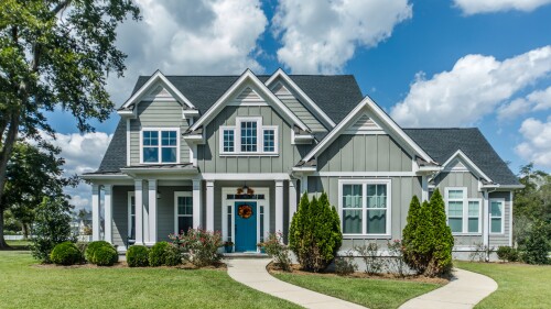 Gray New Construction Modern Cottage Home with Hardy Board Siding and Teal Door with Curb Appeal