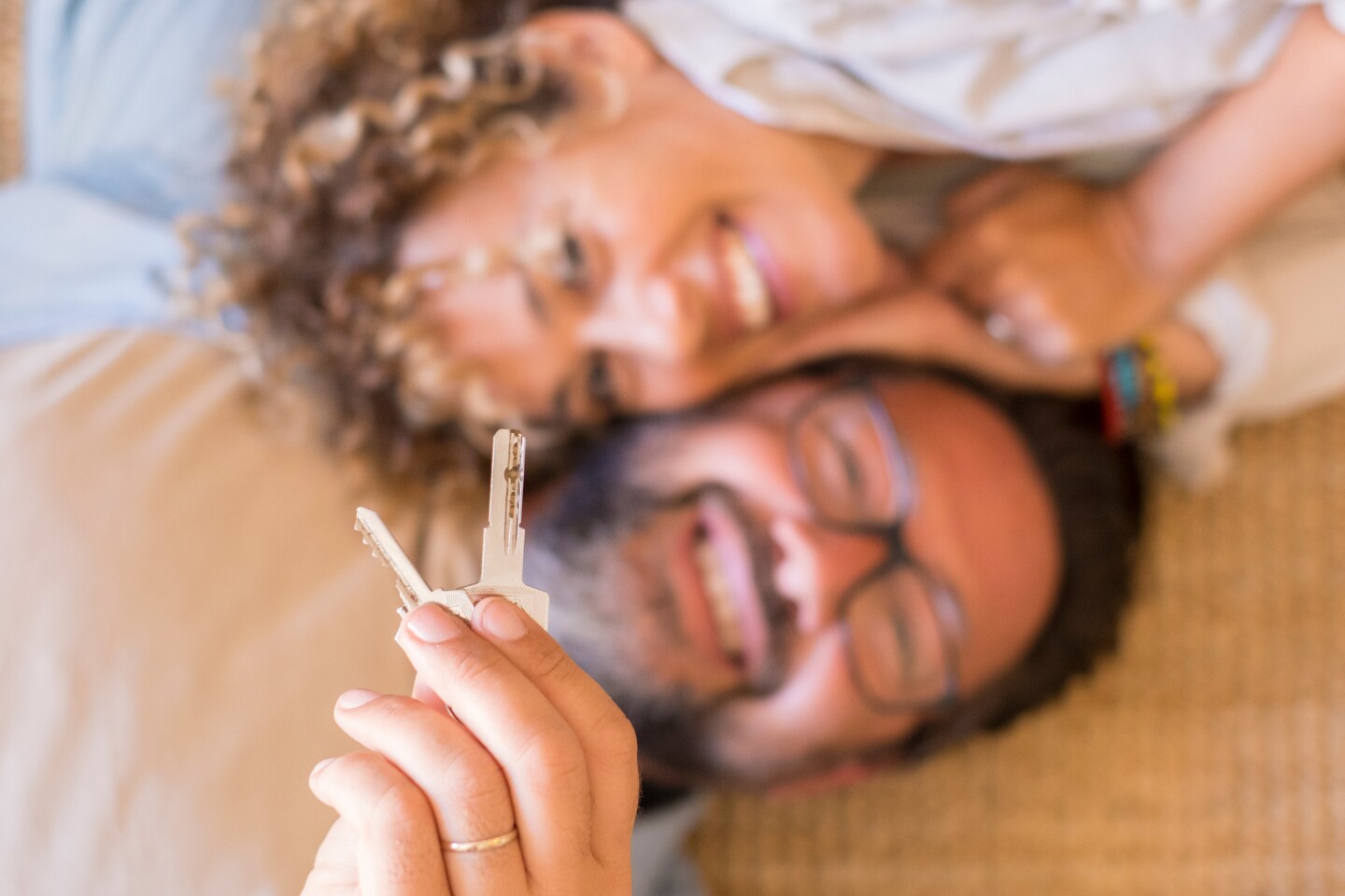 Young couple with keys to dream home